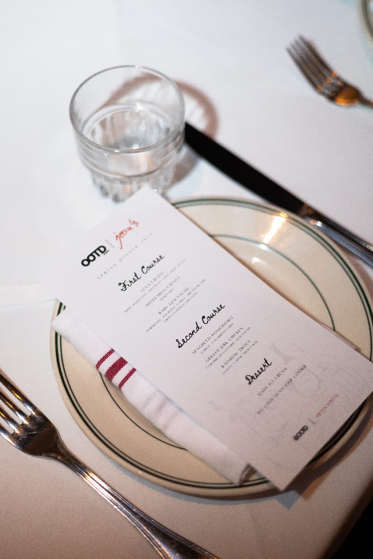 Long dinner table set for a hosted brand dinner