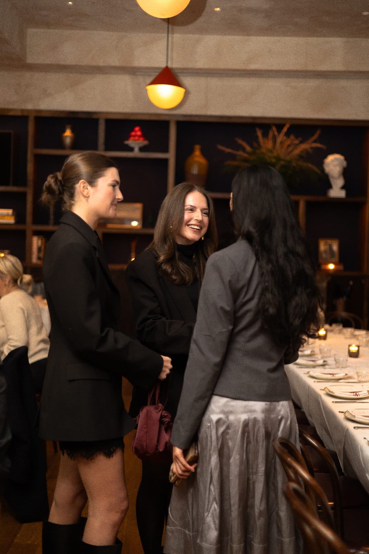 Partners and friends seated together at dinner